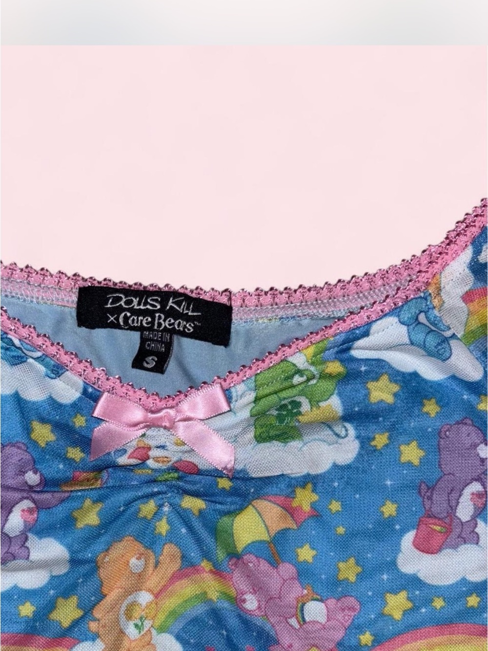 Dolls Kill x Care Bears Blue Rainbow Print Crop Top with Pink Trim - Picture 2 of 7